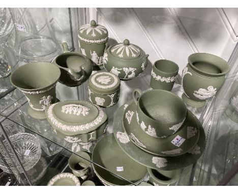 A large quantity of Wedgwood Jasperware, of green ground, all decorated with classical scenes, some with foliate friezes, to 