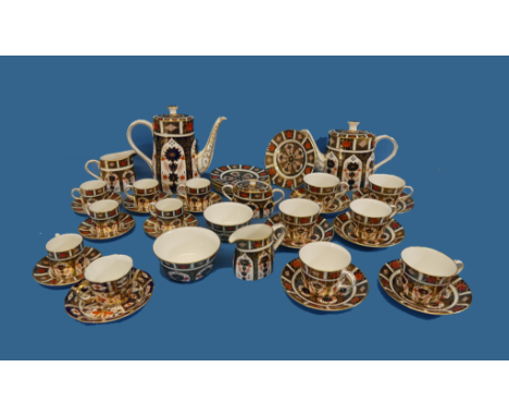 Royal Crown Derby; a 35-piece bone china tea and coffee service, decorated in the Imari palate 1128 pattern, comprising teapo