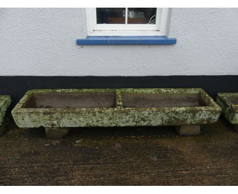 A vintage stoneware long Trough, with central partition, 80in long x 19in wide x 8in high (203cm x 48cm x 20cm).   Note; This