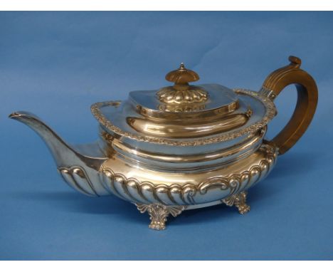 A late Victorian silver Teapot, by Charles Stuart Harris, hallmarked London, 1897, of ovoid form with demi-fluted decoration,