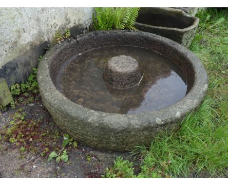 A antique granite circular Grinding Trough, 52in diameter x 26in high (132cm x 26cm). Note; This lot can be Viewed at and mus