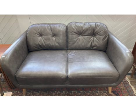 A modern leather&nbsp; retro style Two Seater Sofa, by John Lewis, the button-back in grey leather upholstery, raised on tape