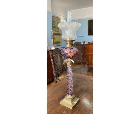 A Victorian purple glass and gilt brass Corinthian column Oil Lamp, the purple glass spiral twist reservoir and column on squ