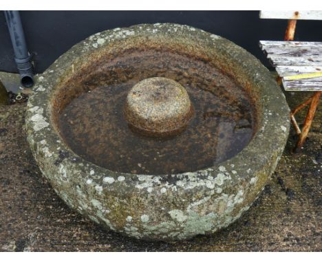Antique granite circular grinding Trough, 42in diameter x 12½in high (107cm x 32cm). Note; This lot can be Viewed at and must