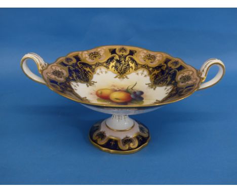 A Royal Worcester (for Waring &amp; Gillow Ltd) porcelain two-handled Tazza, the centre painted with fruit, signed A. Shuck, 