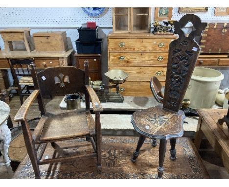 An antique provincial oak child's Commode Chair, together with a carved oak spinning chair (20
