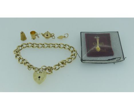 A 9ct yellow gold link Bracelet, with 9ct yellow gold padlock clasp and safety chain, together with five separate charms, inc