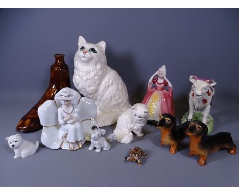 TREACLE GLAZED BOOT FLASK, BESWICK CAT, 22cms tall, Hummel cat and an assortment of similar ornaments