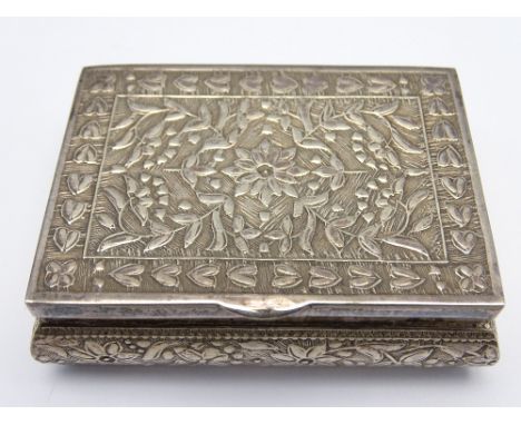 CONTINENTAL WHITE METAL RECTANGULAR SNUFF BOX, the lid, side and front panels having floral decoration, 6 x 4.5cms