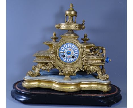 MANTEL CLOCK - French gilt metal on a base and wooden plinth for a dome, (glass not present), overall height 40cms