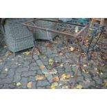 A cast and wrought iron table base.
