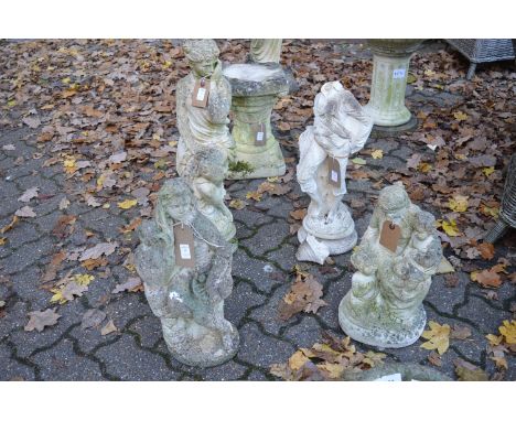 Four various reconstituted stone garden figural ornaments (one decapitated).