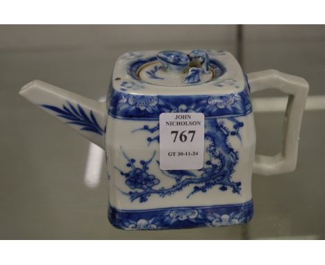 A small Chinese blue and white teapot.