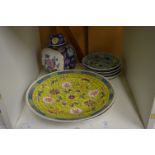 A pair of modern Chinese famille jaune dishes and other items.