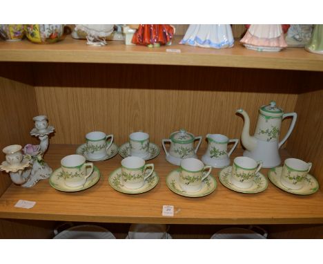 A Noritake coffee service and decorative candelabra.