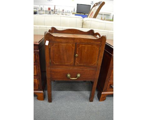 A George III mahogany commode.