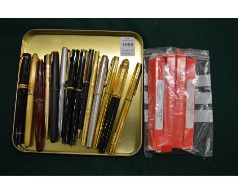 A Mont Blanc ballpoint pen, a Parker Duofold fountain pen and various other pens and accessories.