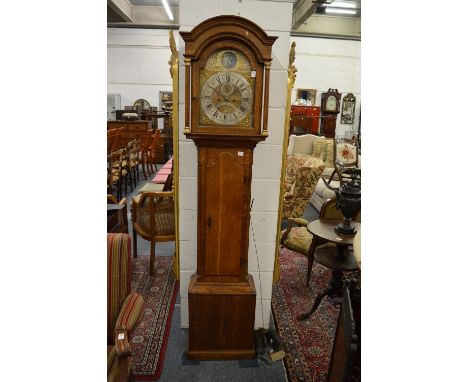 An 18th century oak longcase clock with eight day movement and father time automaton, the arched dial signed John Burges, Gos