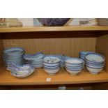 A quantity of Chinese blue and white rice pattern china.