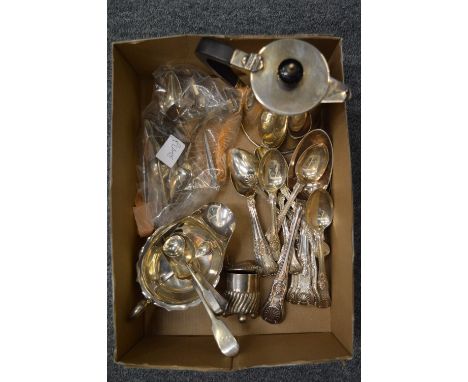 A silver hot water jug, silver sauce boat, various silver flatware etc.