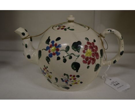 A floral decorated cream ware bullet shaped teapot (faults).