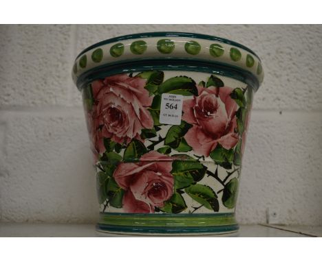 A Wemyss jardiniere decorated with cabbage roses.