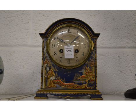 An Asprey retailed chinoiserie decorated mantel clock.