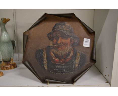Portrait of an old sailor painted on tin.