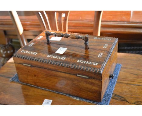 A good 19th century rosewood and mother of pearl inlaid writing box, the drawer with original retailers label for R Dalton.