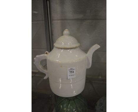 A Chinese blanc de chine teapot.