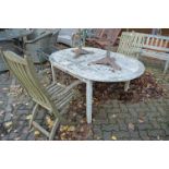 A hardwood garden table and two chairs.