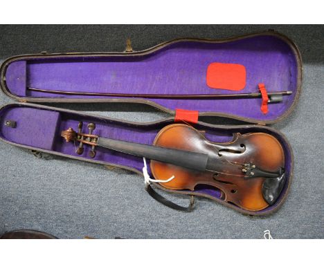 A cased violin.