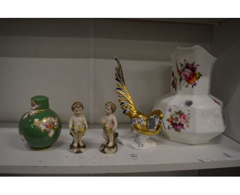 Decorative china to include a pair of figures of cherubs,  a small Royal Worcester green ground jar and cover, Crown Stafford