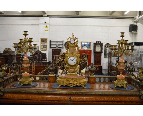 A good large Louis XVI design bronze, ormolu and marble three piece clock garniture, the clock of lyre form, complete with pa