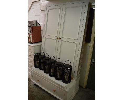 A Neptune white painted two door wardrobe with a drawer below.