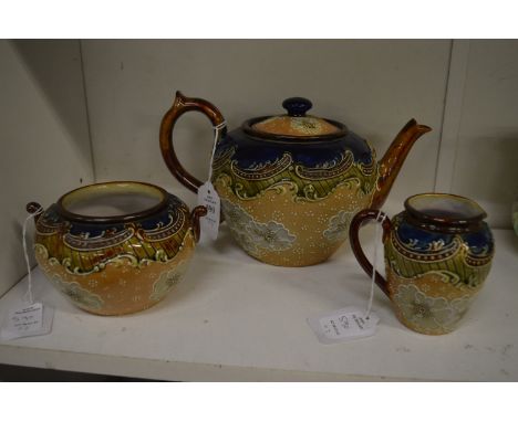 A Royal Doulton Slaters patent three piece tea service comprising teapot, sugar bowl and cream jug.