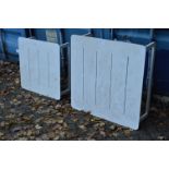Two white painted low garden tables.