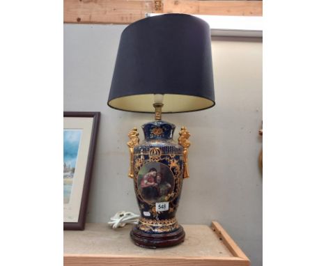 A hand painted classical style table lamp with shade.Collect Only.