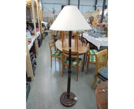 A mahogany standard lamp. COLLECT ONLY