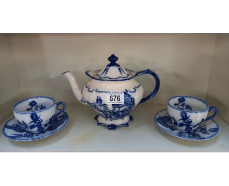 A blue &amp; white Ironstone teapot &amp; 2 matching cups &amp; saucers