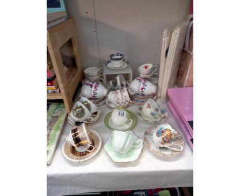 A selection of china cups and saucers.