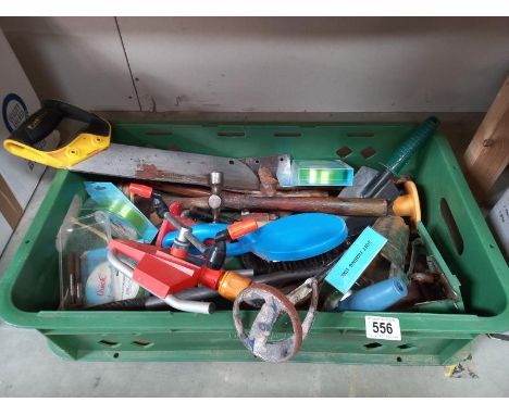 A box of various tools, including 4 new packs of fishing line.