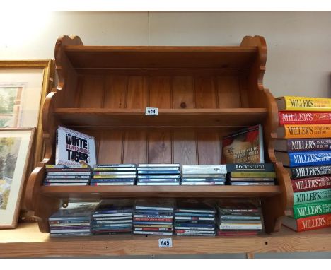 A pine wall shelf.