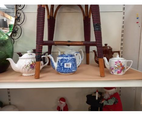 A selection of vintage teapots including blue and white George Jones.