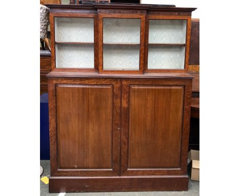 A late George III mahogany and glazed side cabinet, the top section with three glazed doors and watered silk interior, the ba