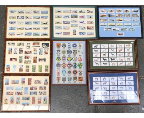 A quantity of framed and glazed cigarette, tea cards and silks to include an uncut set of Mobil Oil silk Football Club Badges