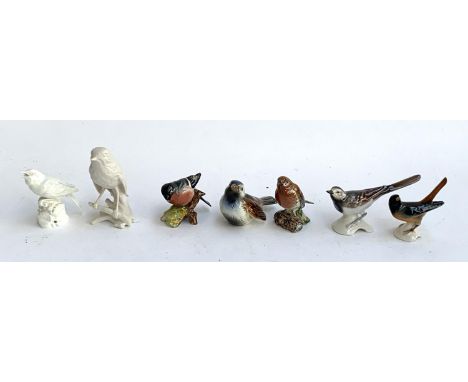 Box of ceramic birds - Two Beswick birds, Robin and Blue Finch and five Goebel birds. 