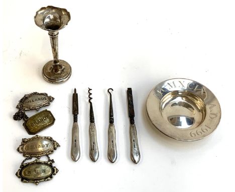 A silver pin pin dish, engraved AD 1999, 2.8ozt; together with silver spill vase AF; four plated decanter labels; four silver