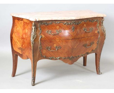 A 20th century French Louis XV style kingwood and floral marquetry two-drawer commode with a shaped marble top and gilt metal