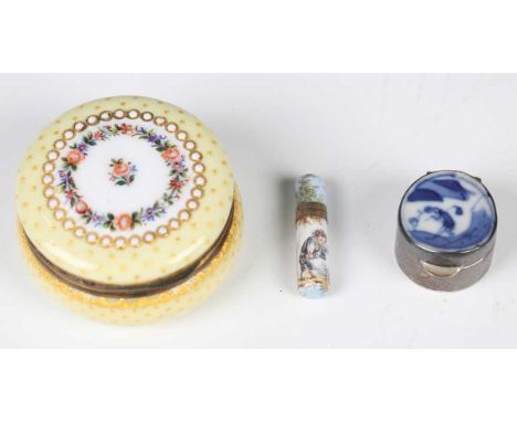 A late 19th century French yellow glazed porcelain circular snuff box, the exterior finely decorated with gilt stars and flow